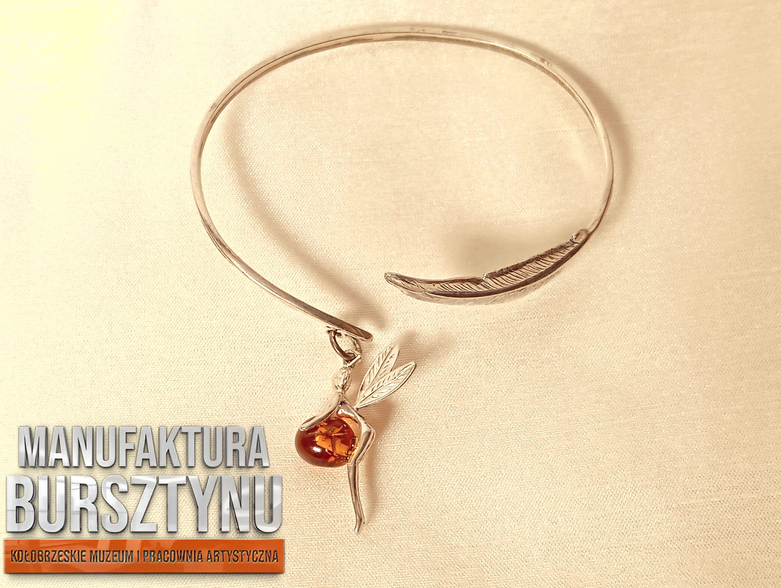 Srebrna bransoletka z wróżką i bursztynem